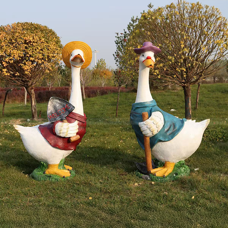 Fiberglass Goose Yard Statue holding welcome shovel