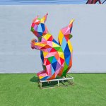 Small colorful Geometric Squirrel Statue outdoors