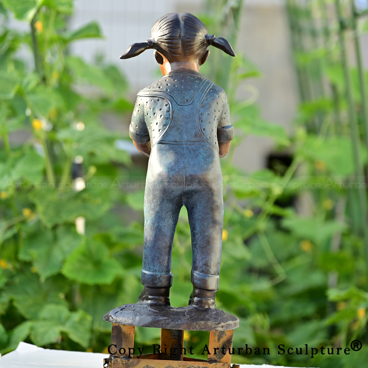 3 Bronze child sculpture back detail