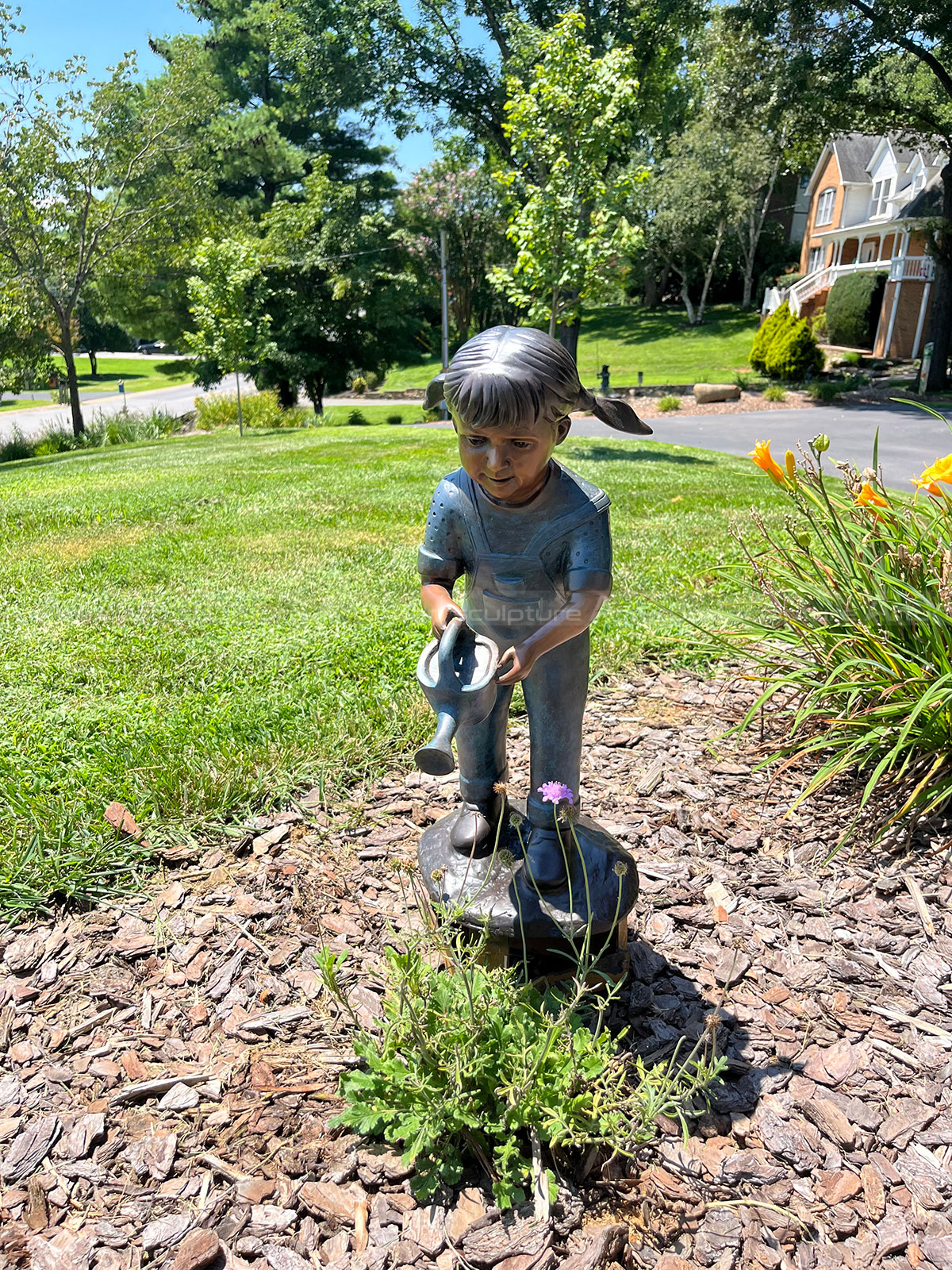 Bronze Girl with Watering Can Statue garden