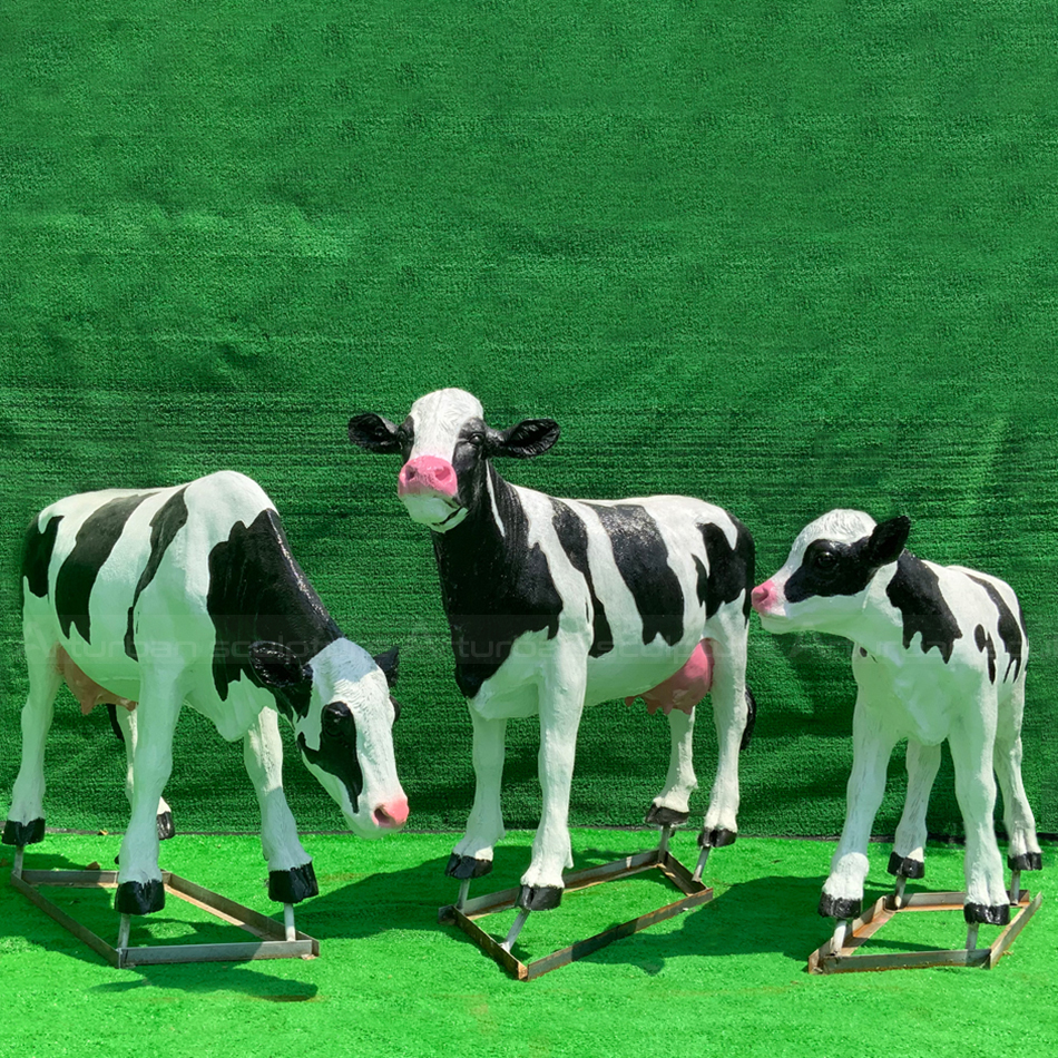 Dairy Cow Sculpture with Holstein cow family