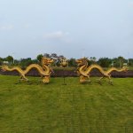 Fiberglass Asian Dragon Sculpture pair on lawn