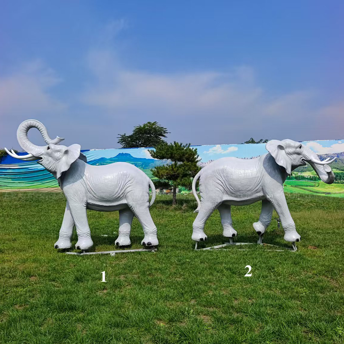 Fiberglass Elephant Garden Décor pair on grass