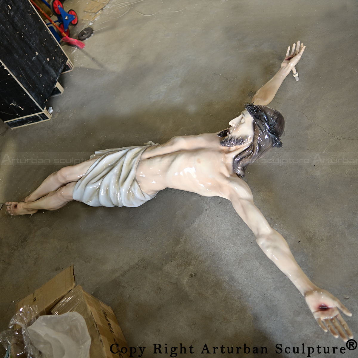 3 Fiberglass crucified Jesus sculpture in workshop