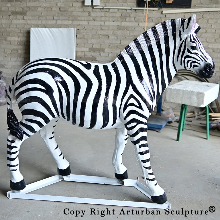 3 Side view of striped zebra statue