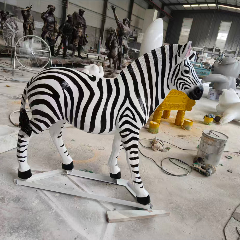 4 Hand-painted zebra sculpture in workshop