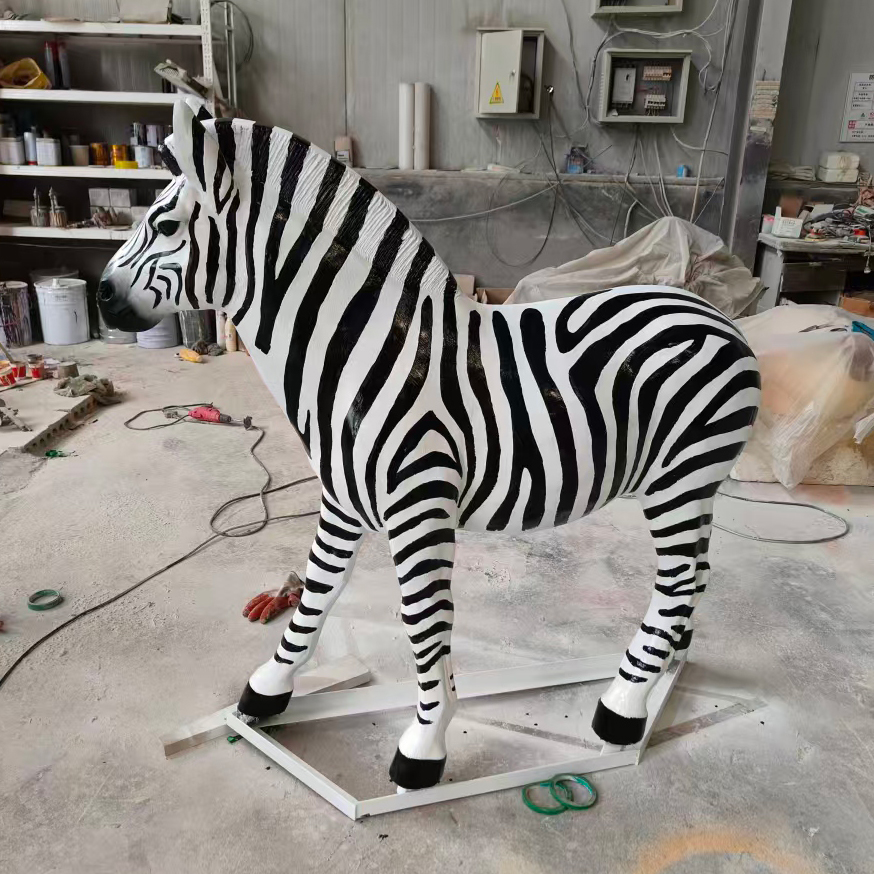 4 fiberglass Zebra statue in sculpture workshop