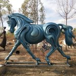 Bronze Contemporary Horse Statue displayed outdoors among trees