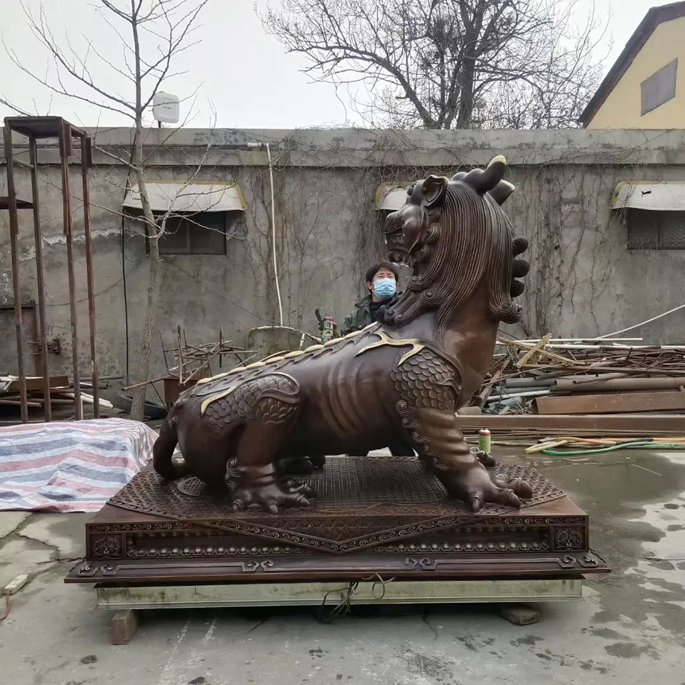Bronze Diting Sculpture showing scaled side details