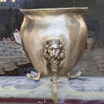Bronze garden urns detailed lion head front