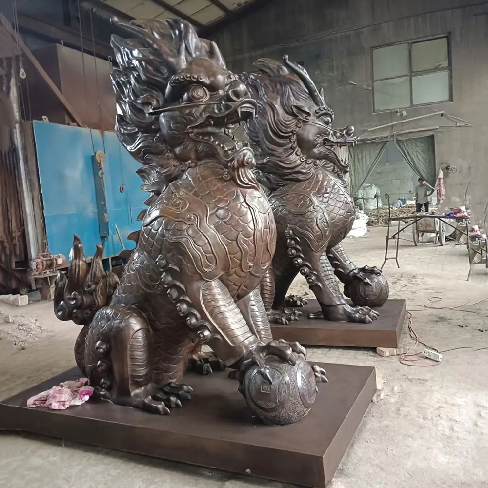 Bronze qilin sculpture pair with guardian balls