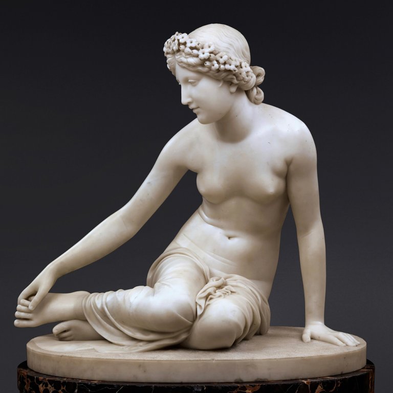 Marble water nymph sculpture of seated Salmacis