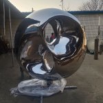 Abstract stainless steel Tai Chi Sculpture outdoors