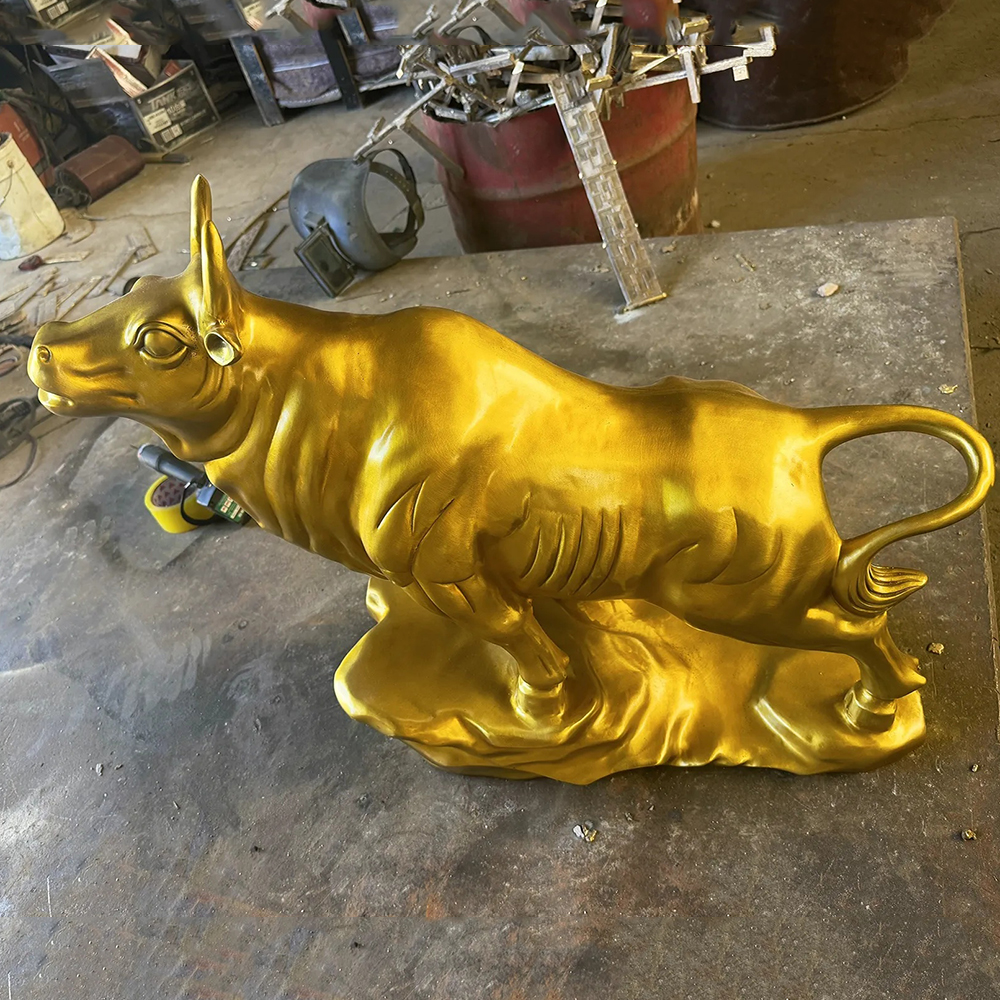 Golden Bull Sculpture in Bronze on Rocky Base