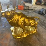 Golden Bull Sculpture with Bronze Curled Tail