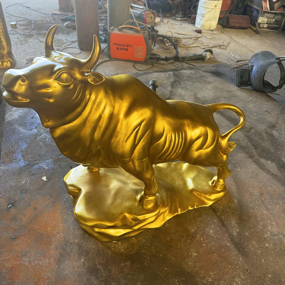 Golden Bull Sculpture with Bronze Curled Tail