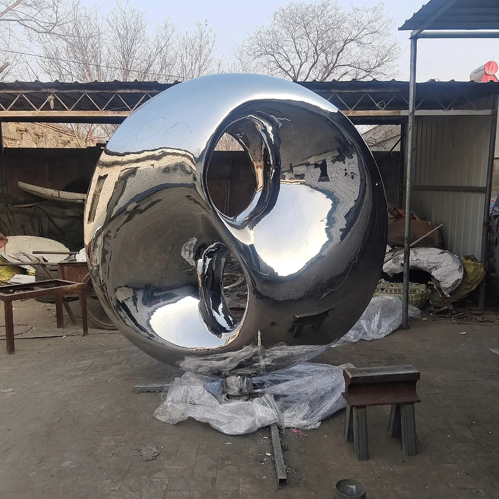 Mirror polished stainless steel Tai Chi Sculpture