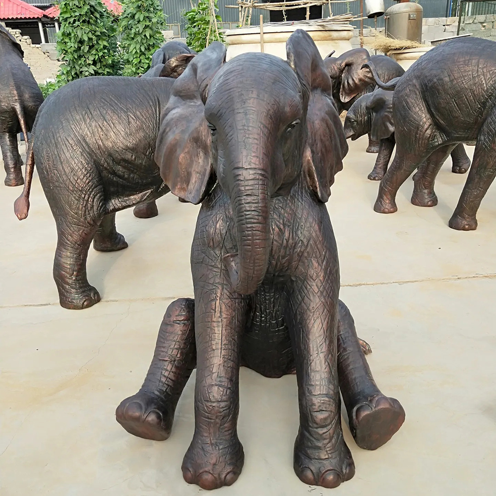 Sitting Bronze Baby Elephant Statue with Extended Legs