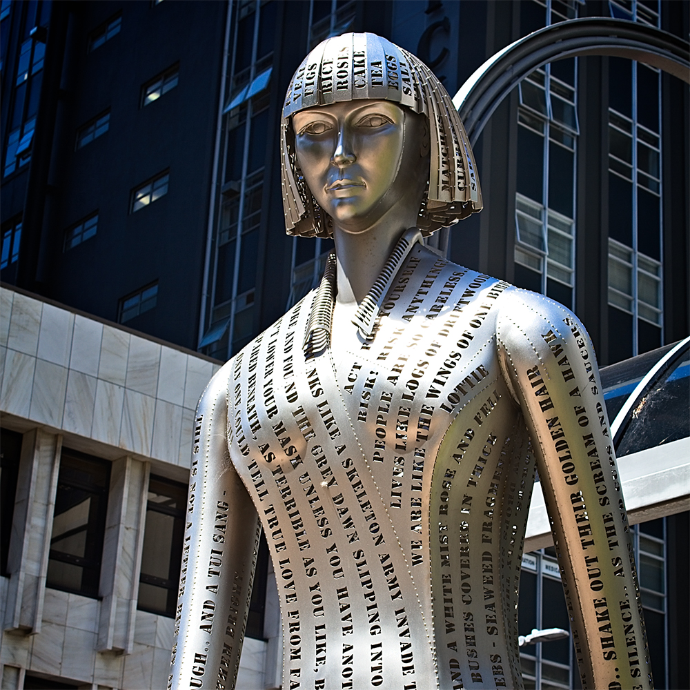 Woman of Words Statue with stainless steel lettering
